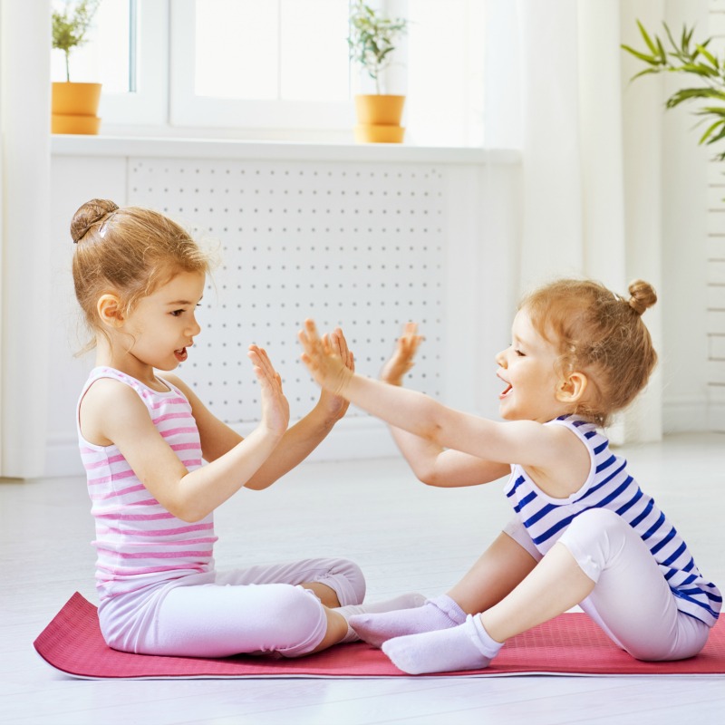 The Inspired Treehouse - These poses are a great way to introduce partner yoga for kids!