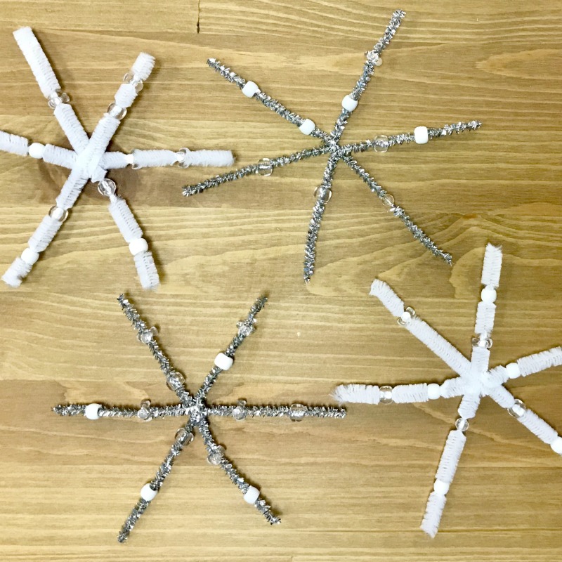 The Inspired Treehouse - Check out these super simple snowflake crafts for kids!  A great way to keep little hands busy this winter while working on fine motor coordination and grasping skills!