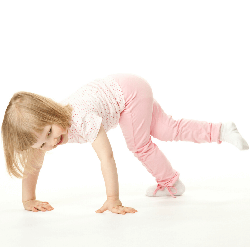 child playing on the floor with white background