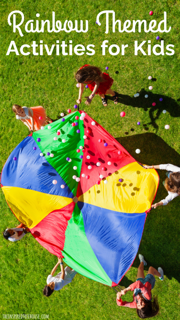 Rainbow Themed Activities for Kids - image of colorful play parachute with balls on it, kids holding onto handles